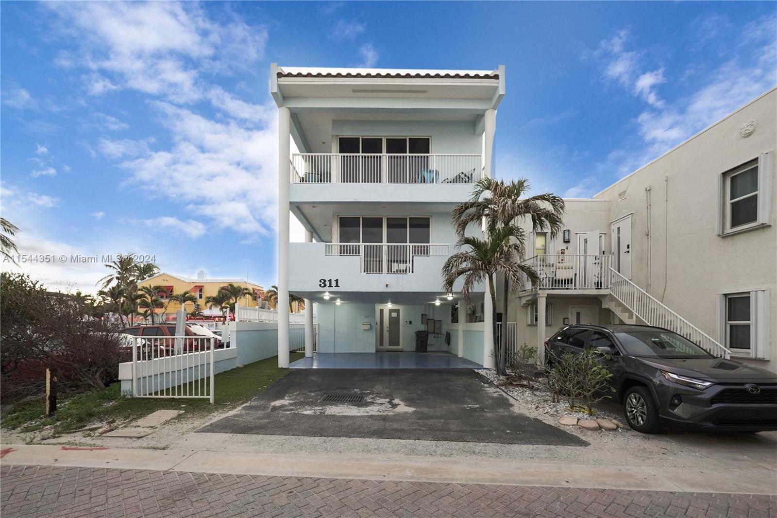 a view of a house with a patio