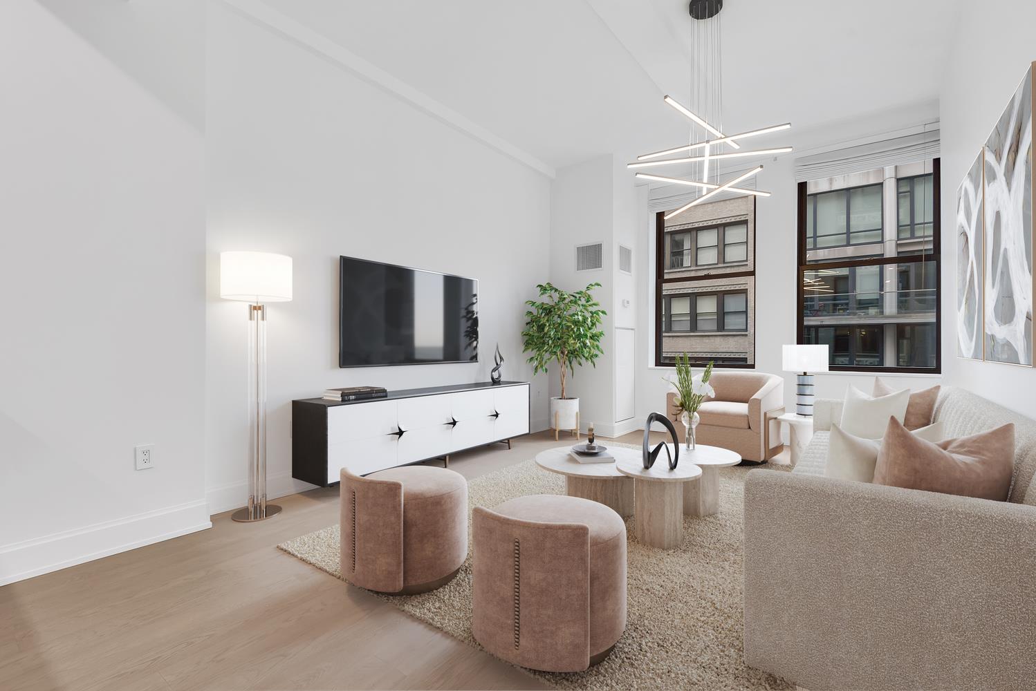 a living room with furniture and a flat screen tv