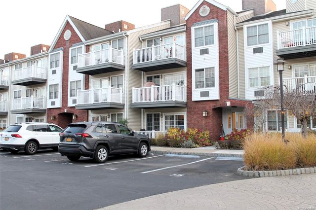 $535,000 | 94-42 Magnolia Court, Unit 2B | Ozone Park