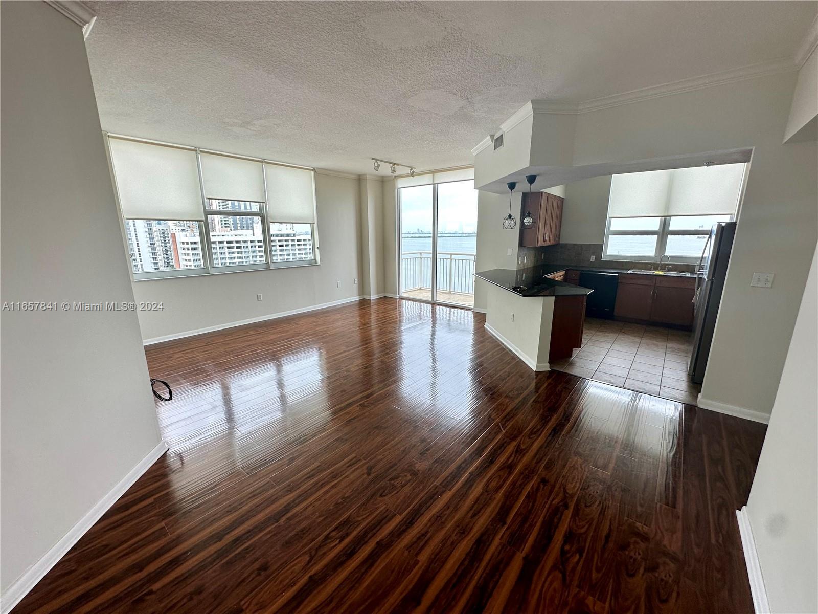 a view of a living room filled with furniture