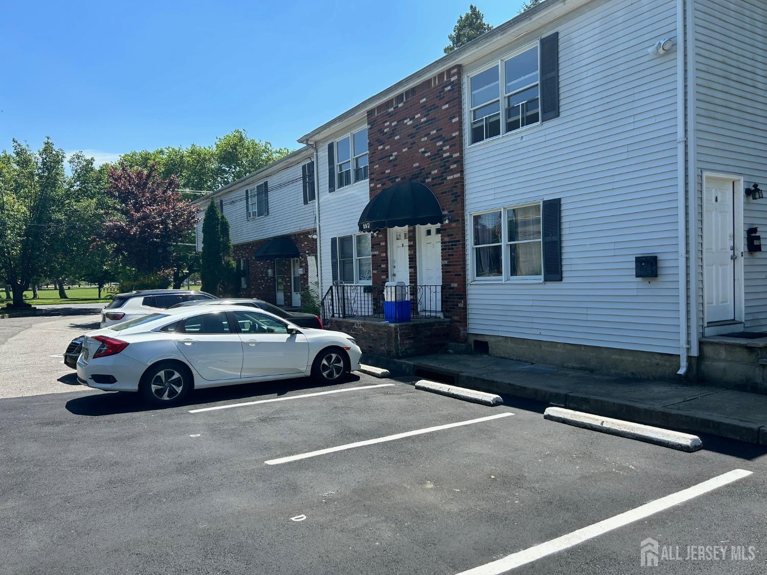 a car parked in front of a house