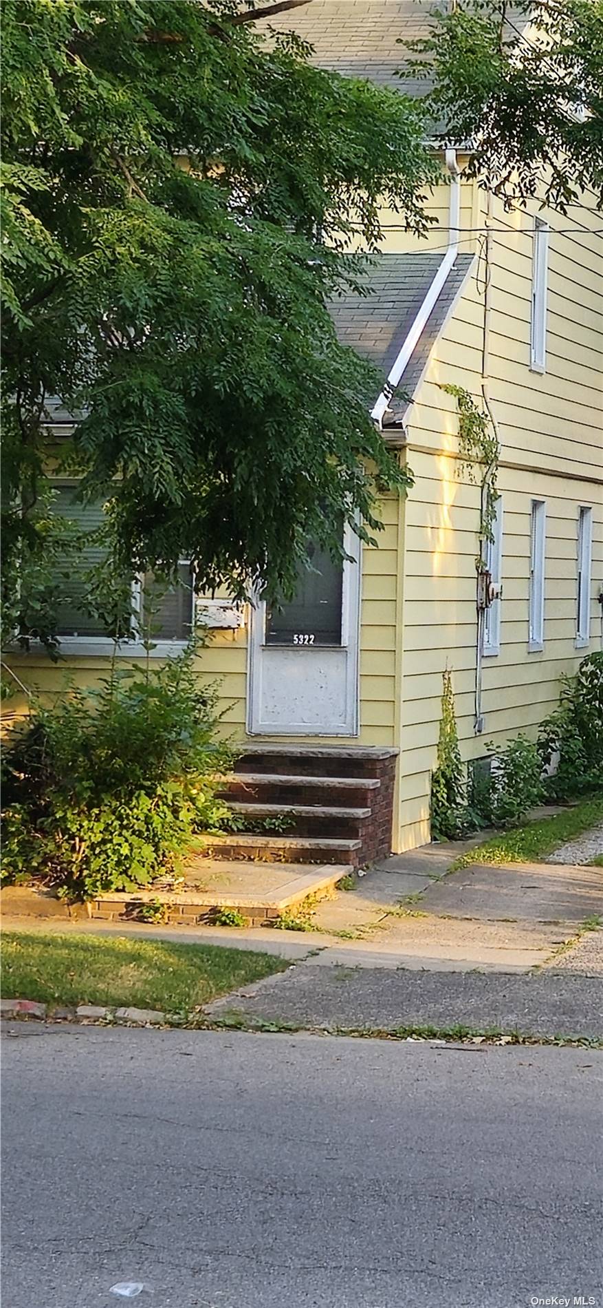 a view of a house with a swimming pool