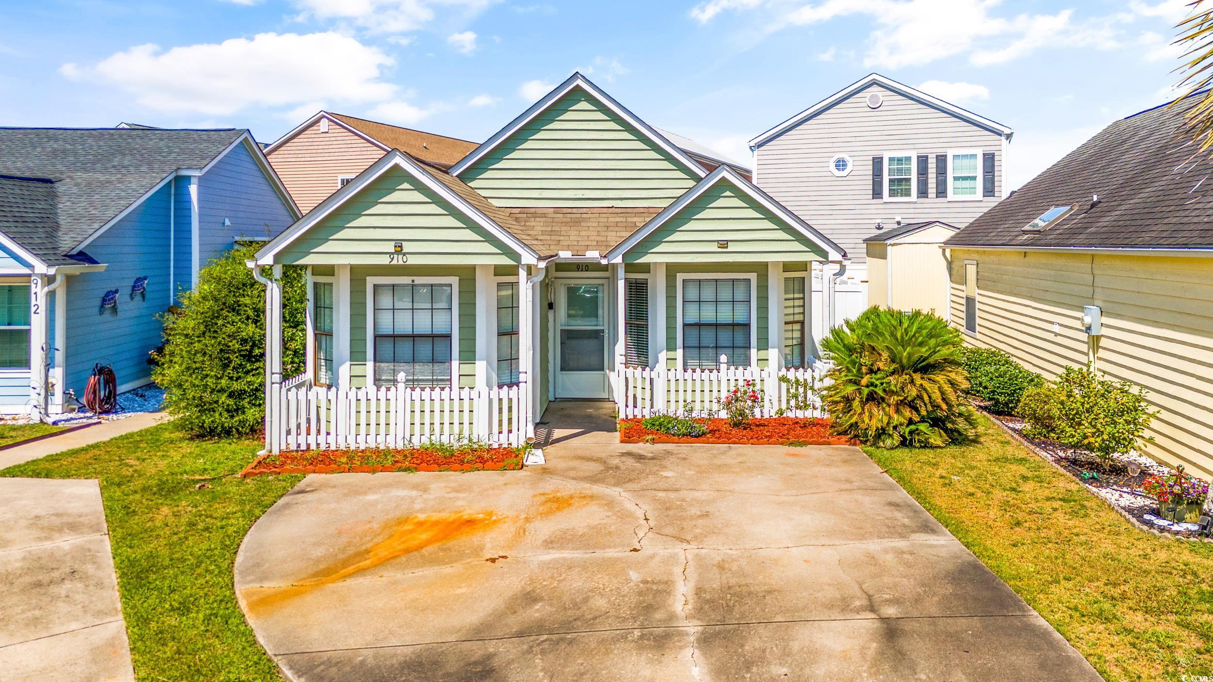 Bungalow-style house featuring a front yard and a