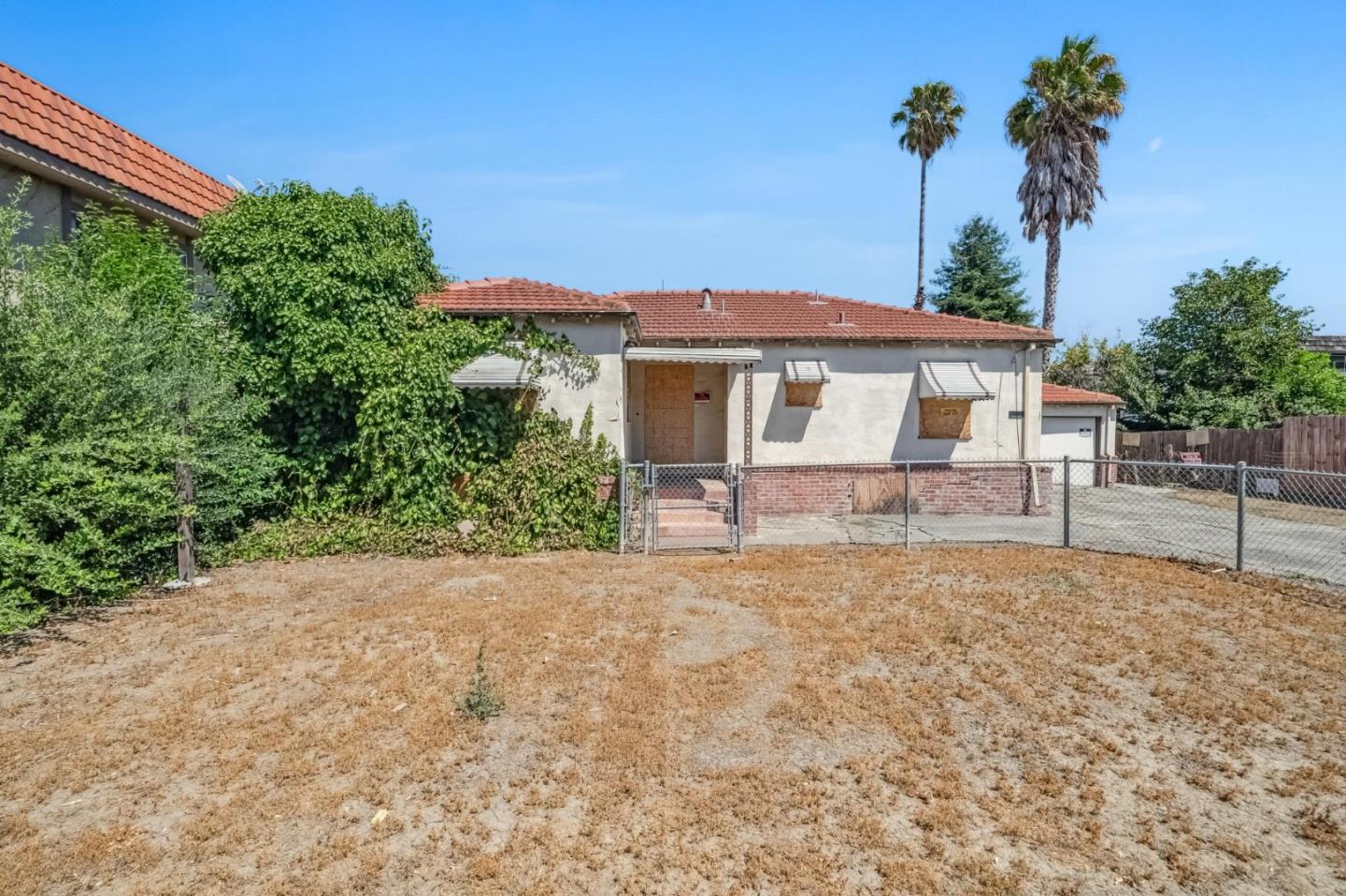 a house view with a garden space