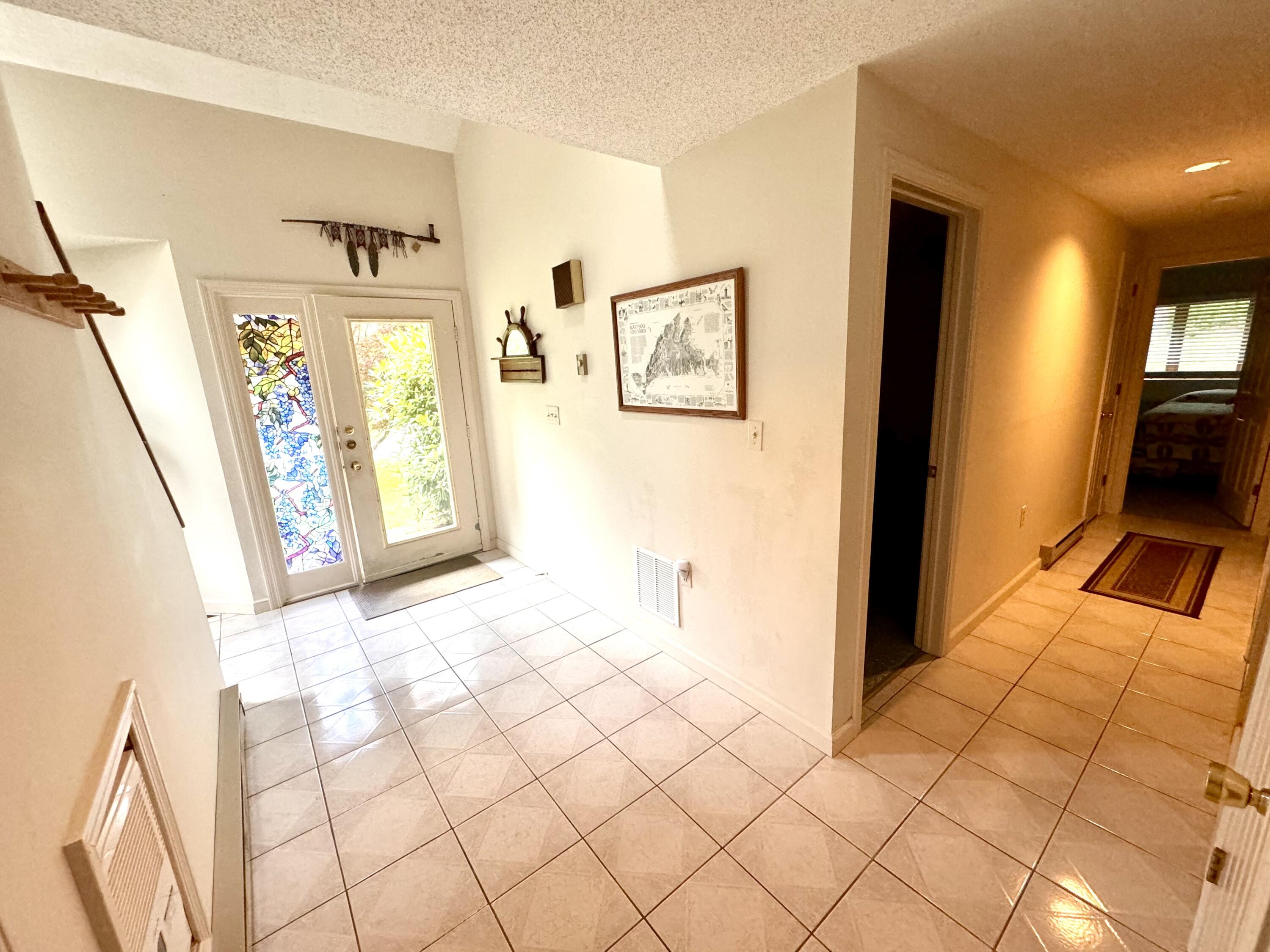 a view of an empty room and window