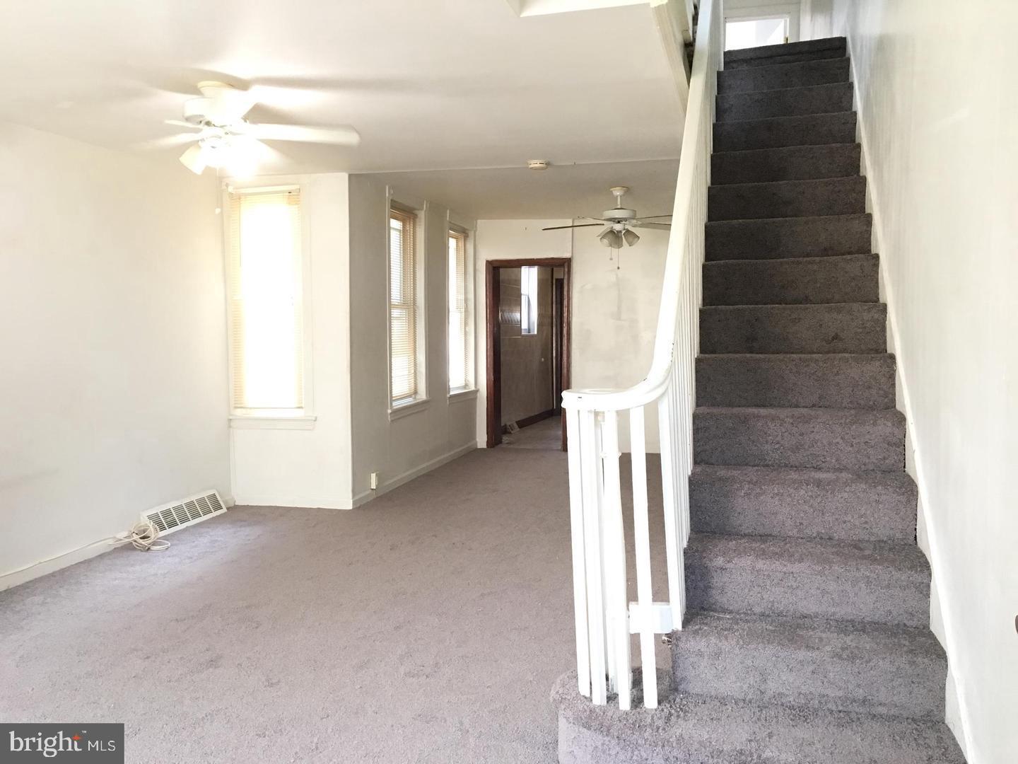 a view of entryway with a front door