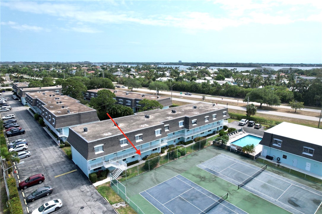 an aerial view of a city with lots of residential buildings