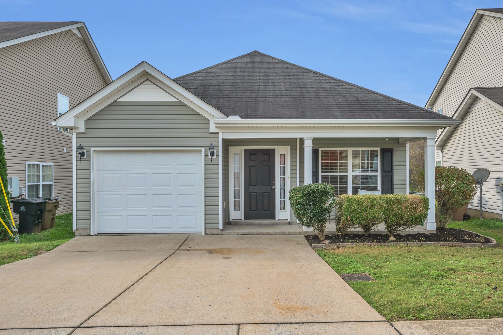 front view of a house and a yard