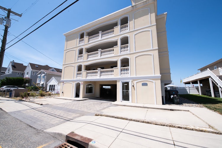 a front view of a building with street