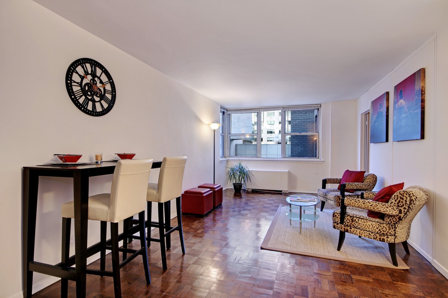 a living room with furniture and a window