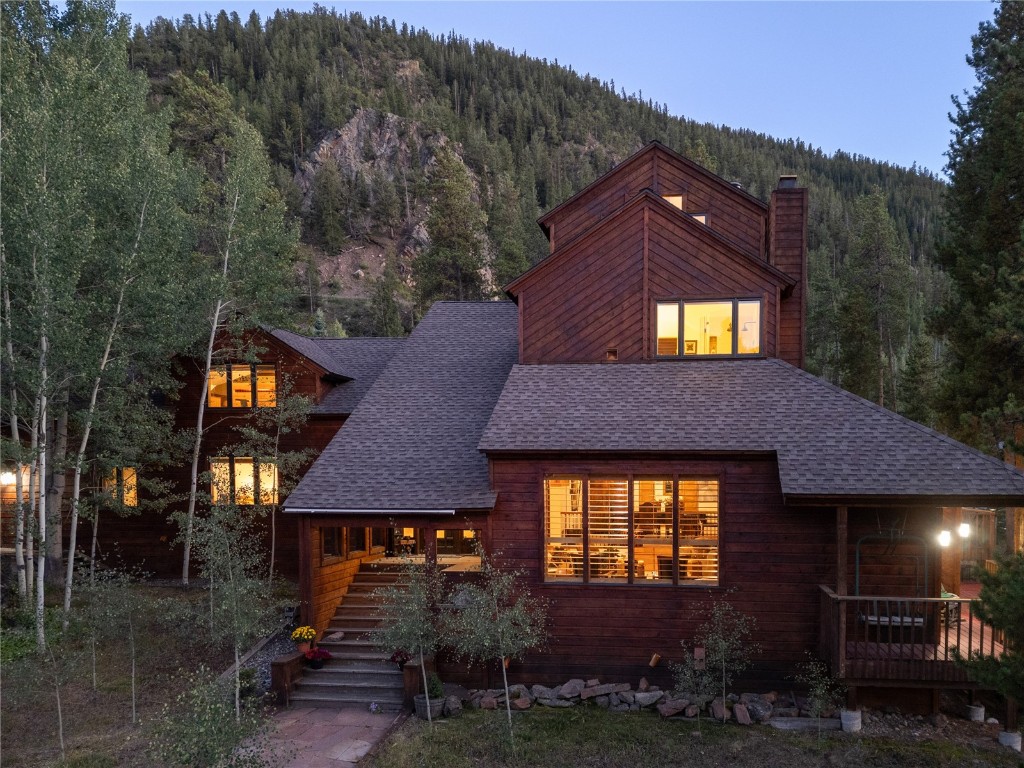 View of front of house with a mountain view