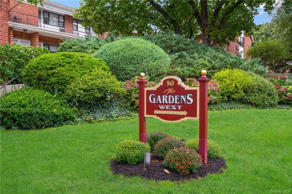 a sign that is sitting in the grass