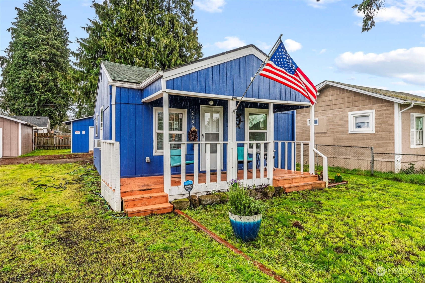 a front view of a house with porch