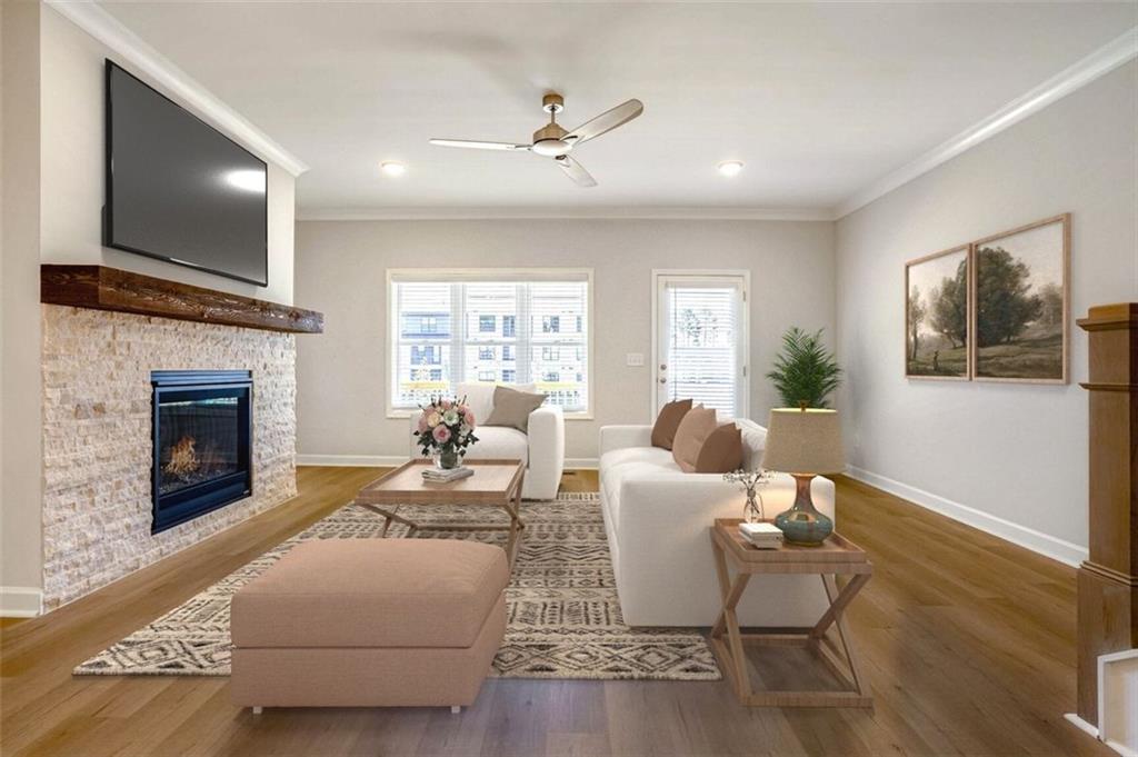 a living room with furniture fireplace and a flat screen tv