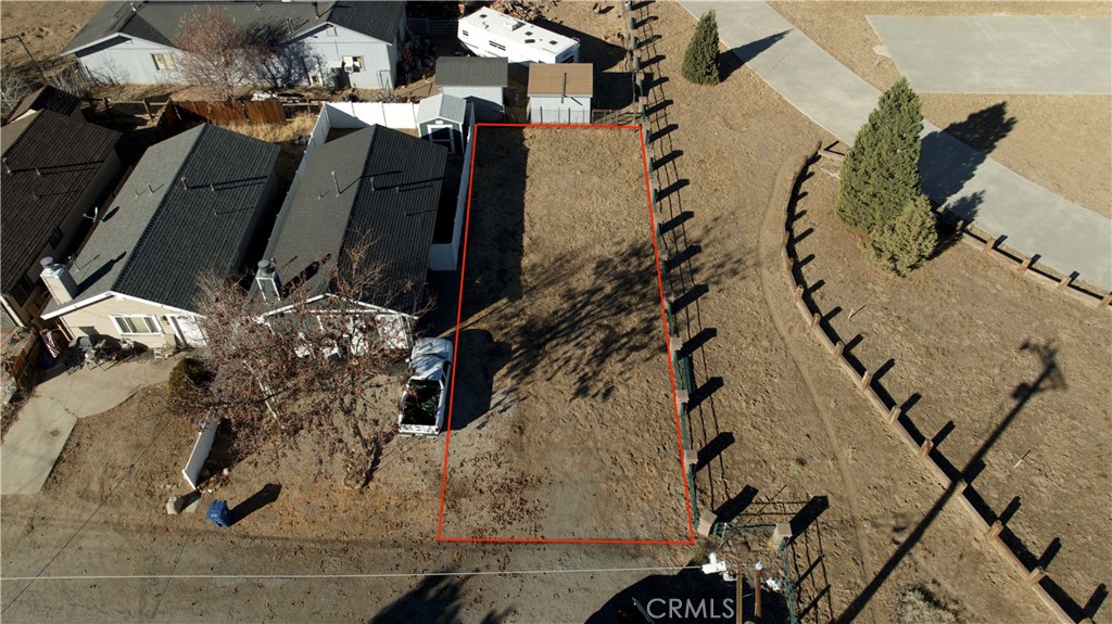 an aerial view of houses with outdoor space