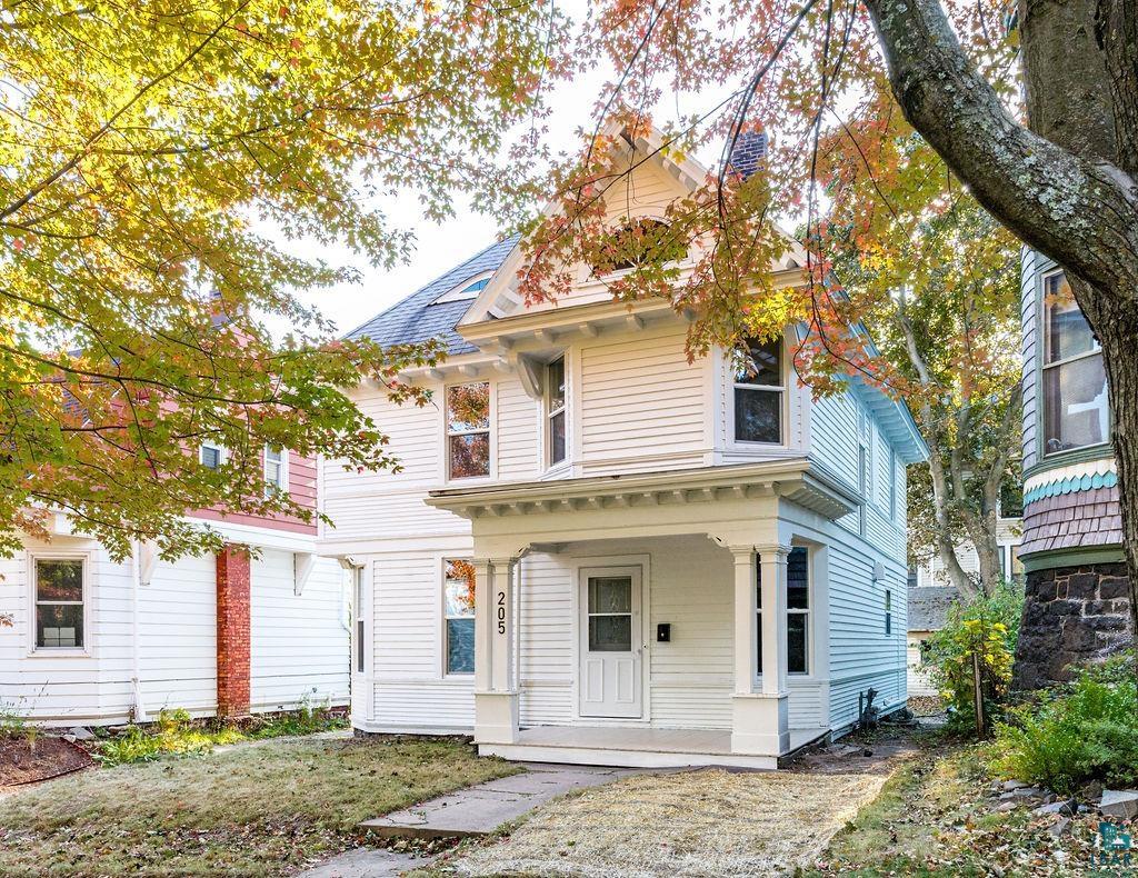 View of front of property with a porch