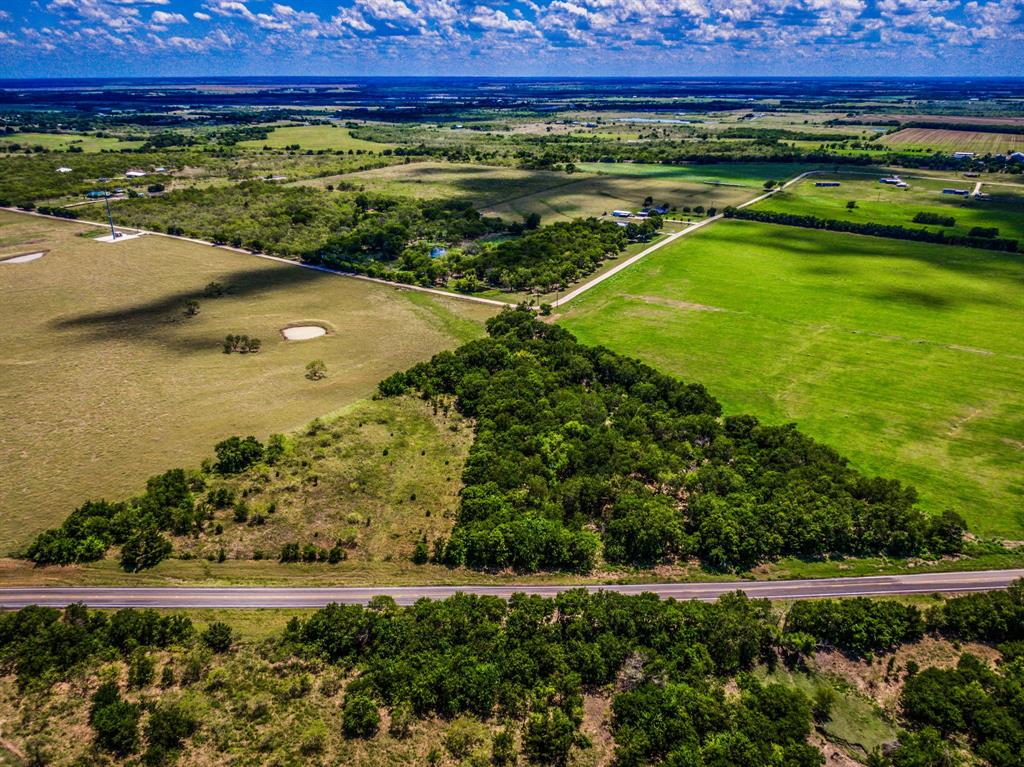 a view of a lush green field