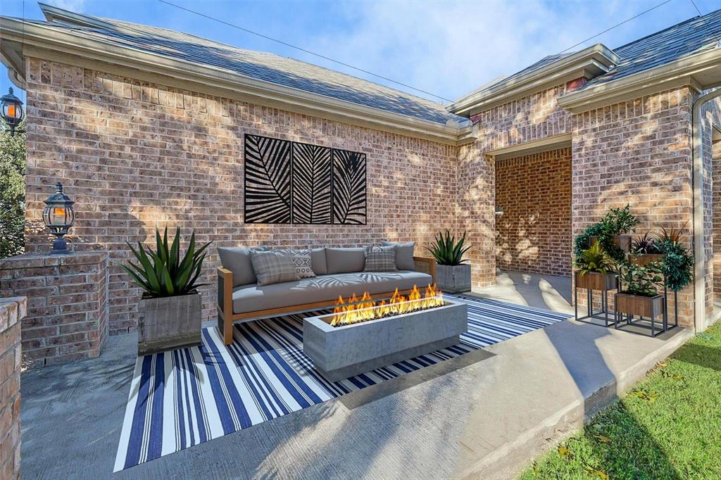 a living room with patio furniture and a potted plant