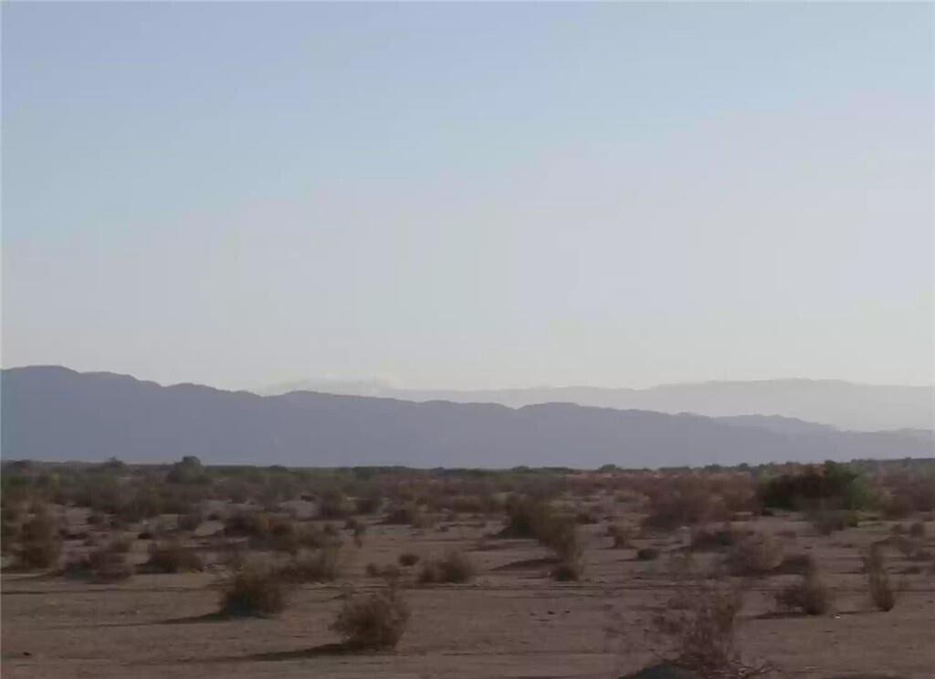 a view of city and mountain