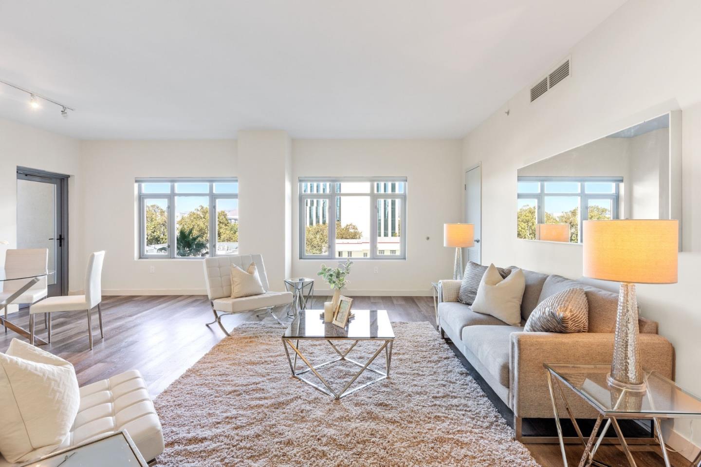 a living room with furniture and a couch