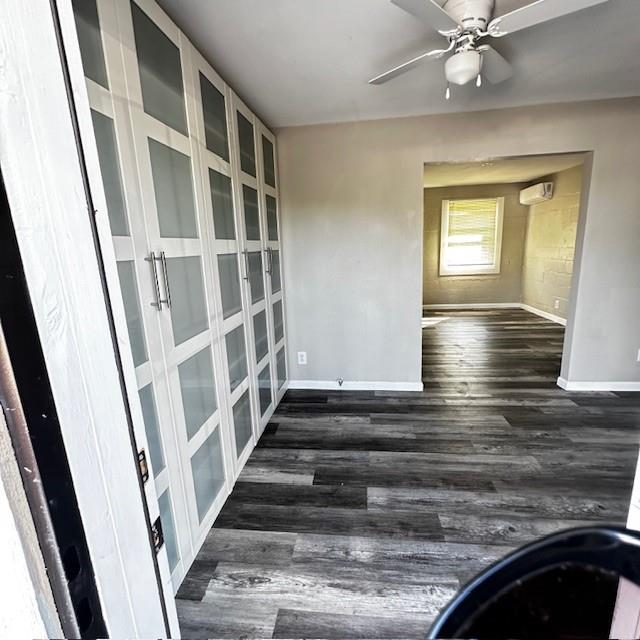 a view of an entryway with wooden floor and staircase