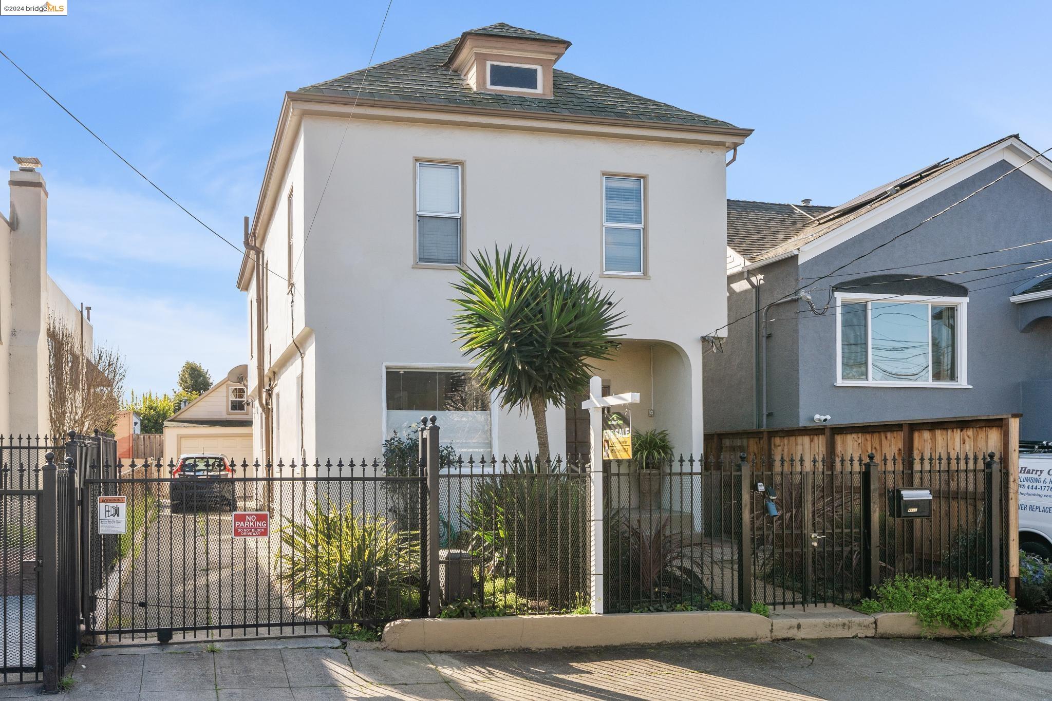 a view of a house with a street