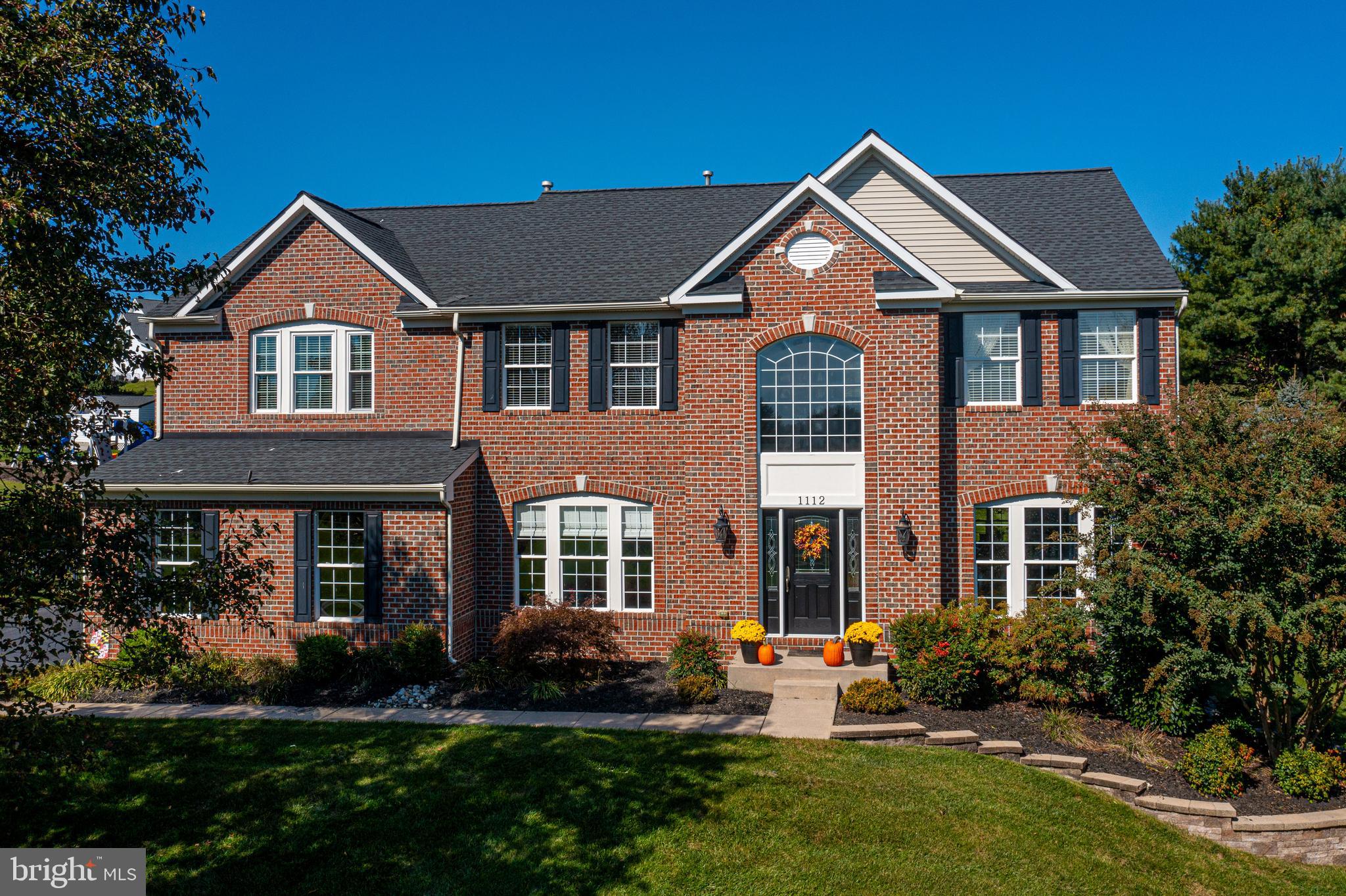 front view of house with a yard