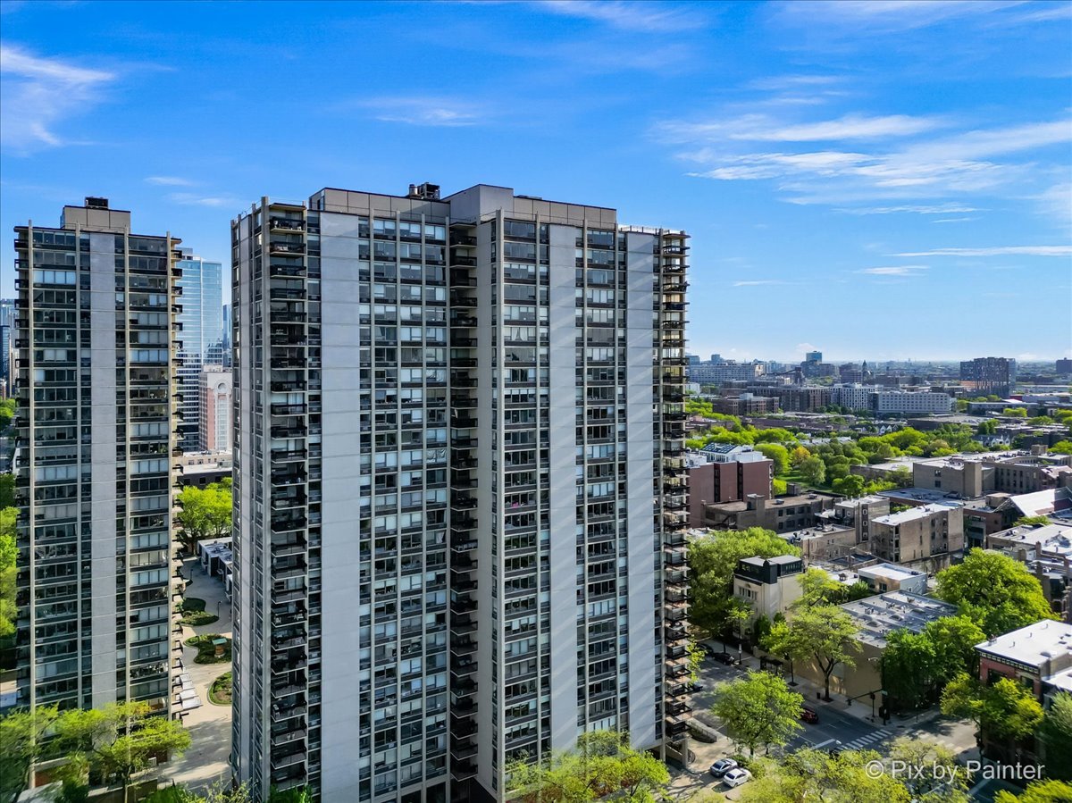 a view of a city with tall buildings