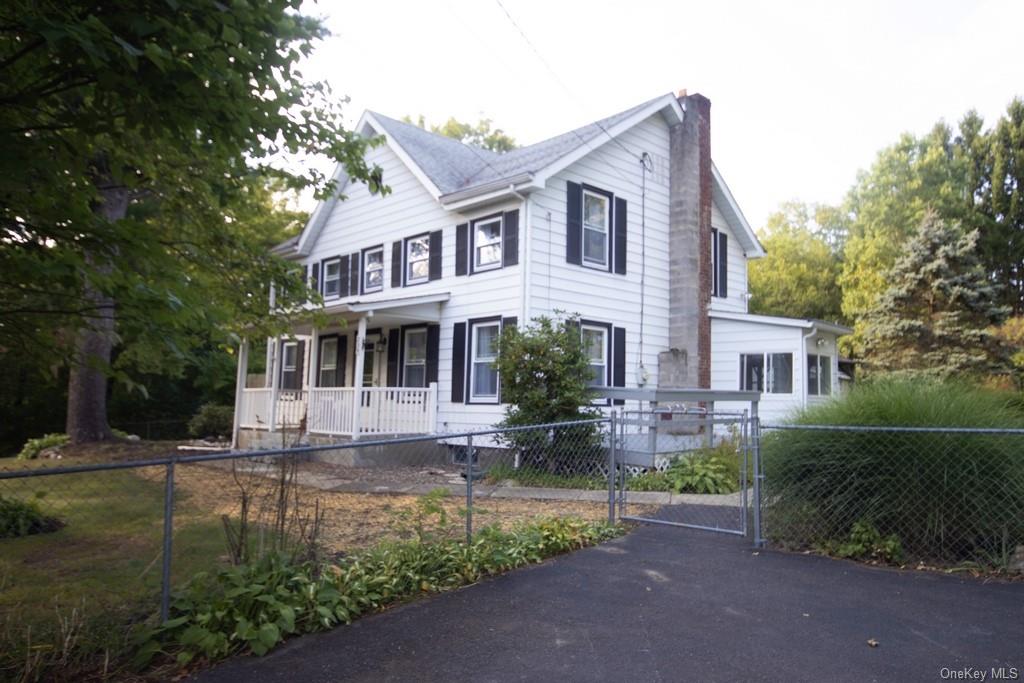 View of front facade featuring a porch