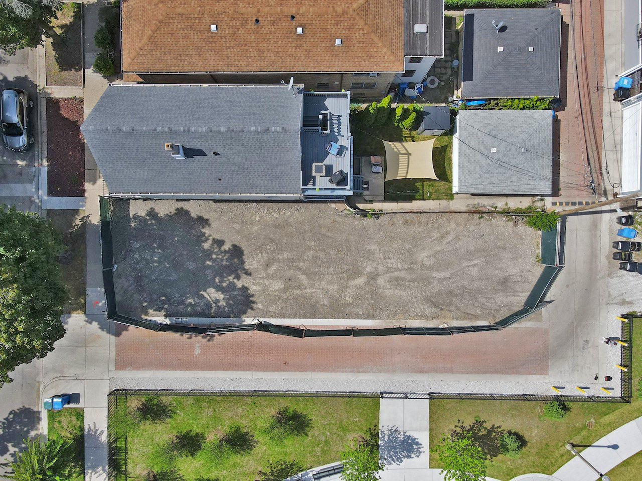 an aerial view of a house with yard swimming pool and outdoor seating