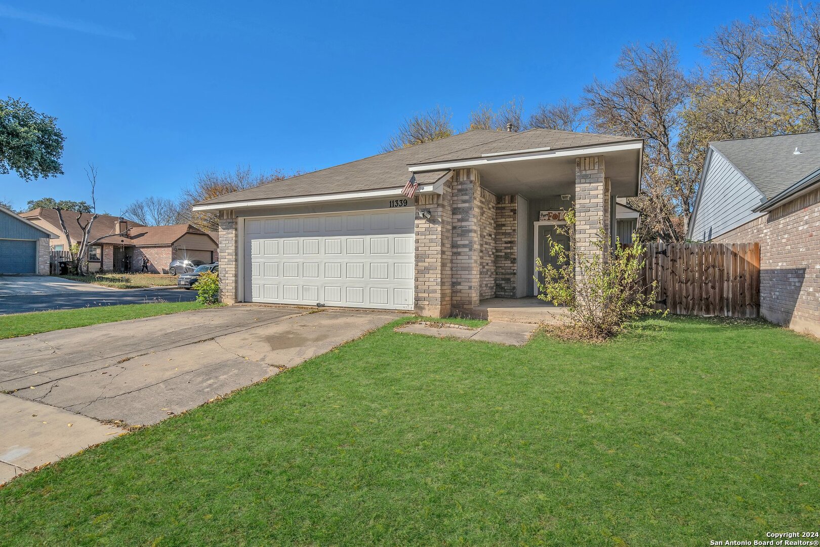 front view of a house with a yard