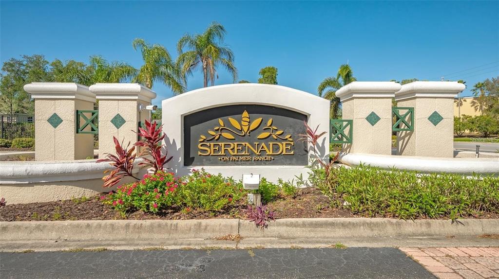 a view of front door and sign board