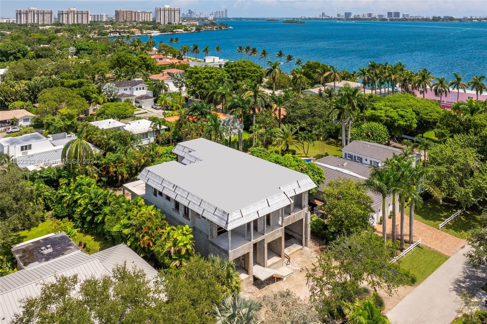 an aerial view of a house with a garden