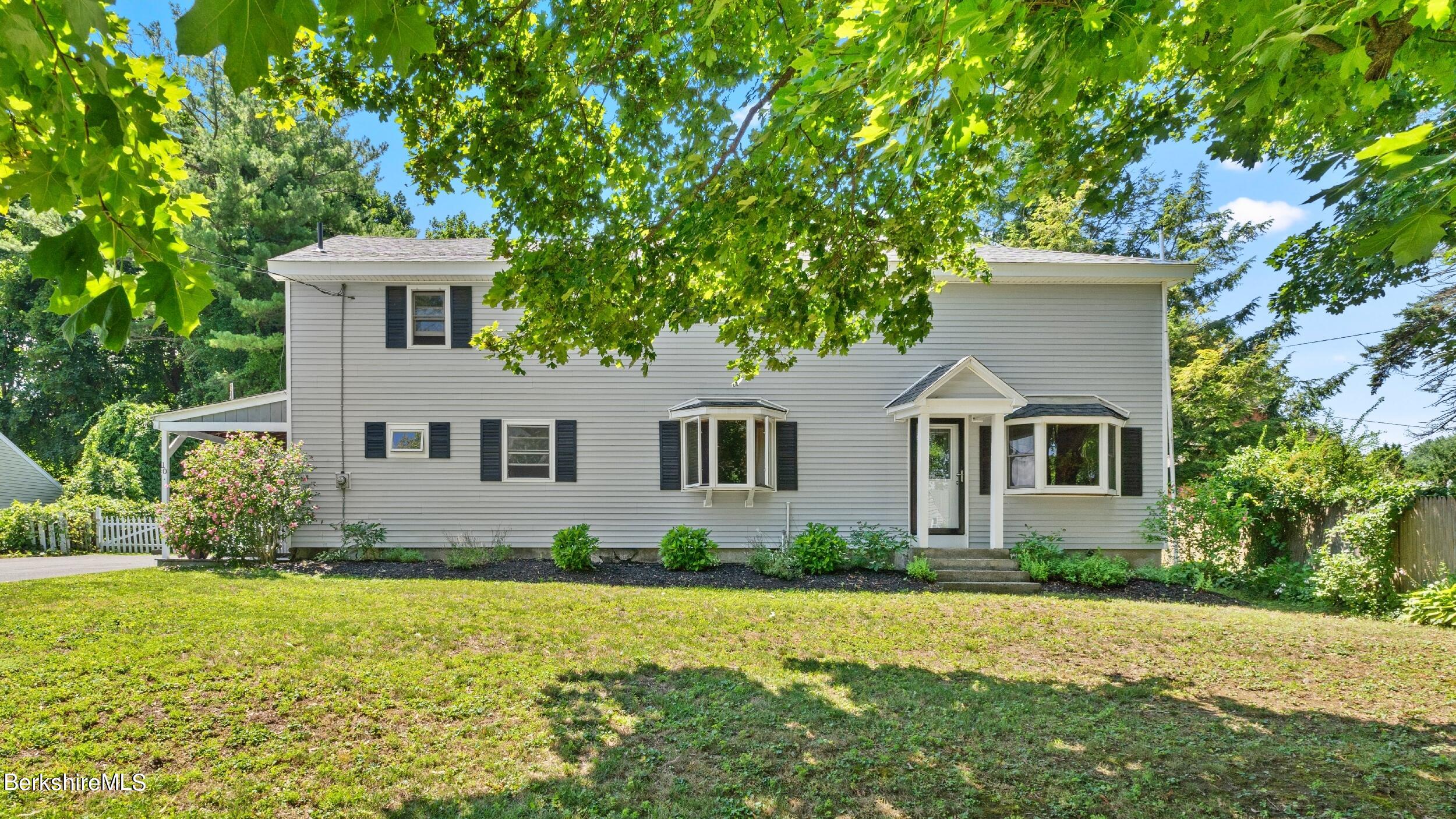 front view of house with a yard