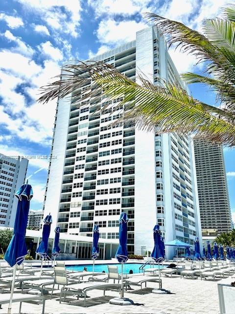 a front view of a multi story residential apartment building