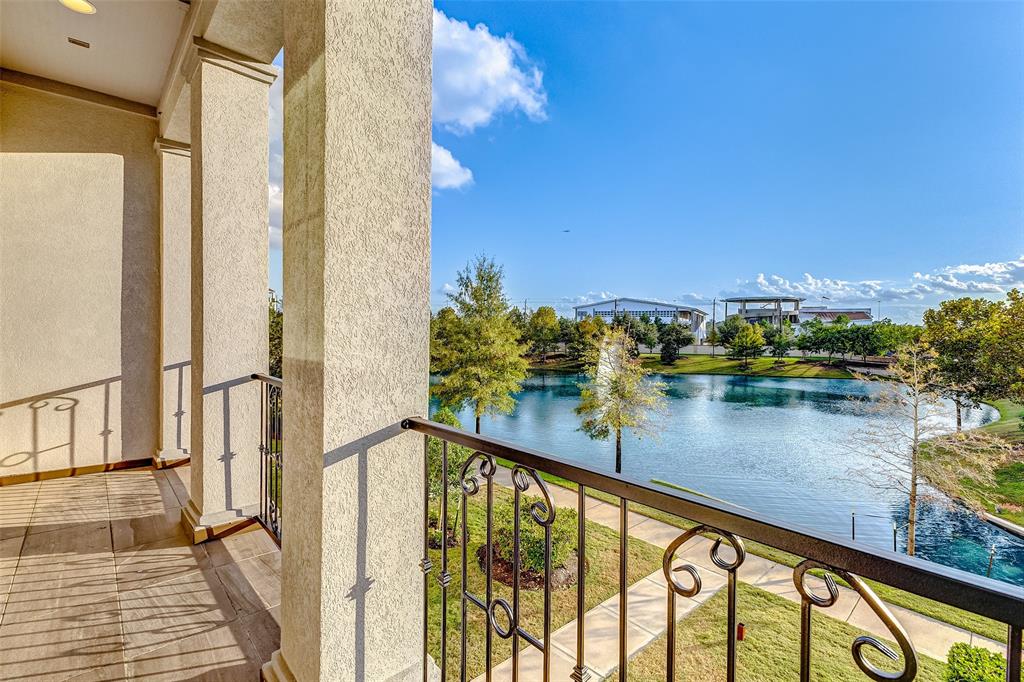 a view of a lake from a balcony