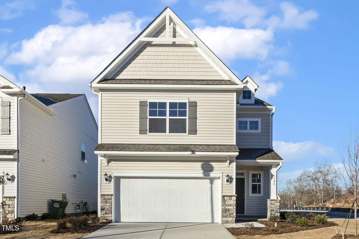 a view of a house with a street