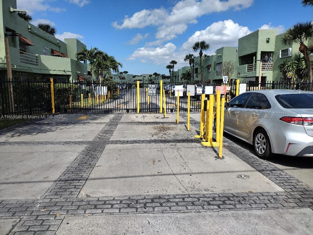 a view of a street with cars