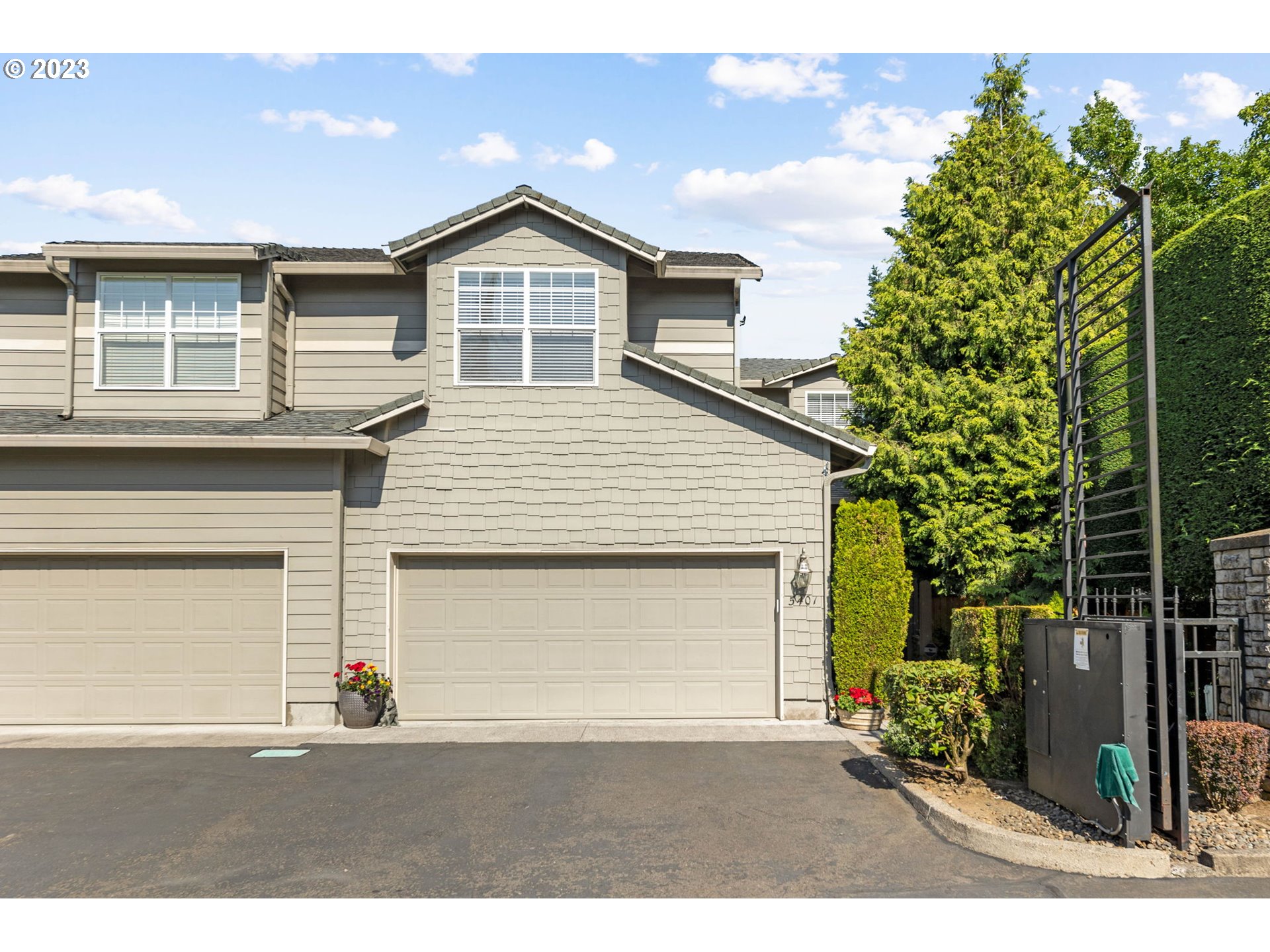 a front view of a house with a garage