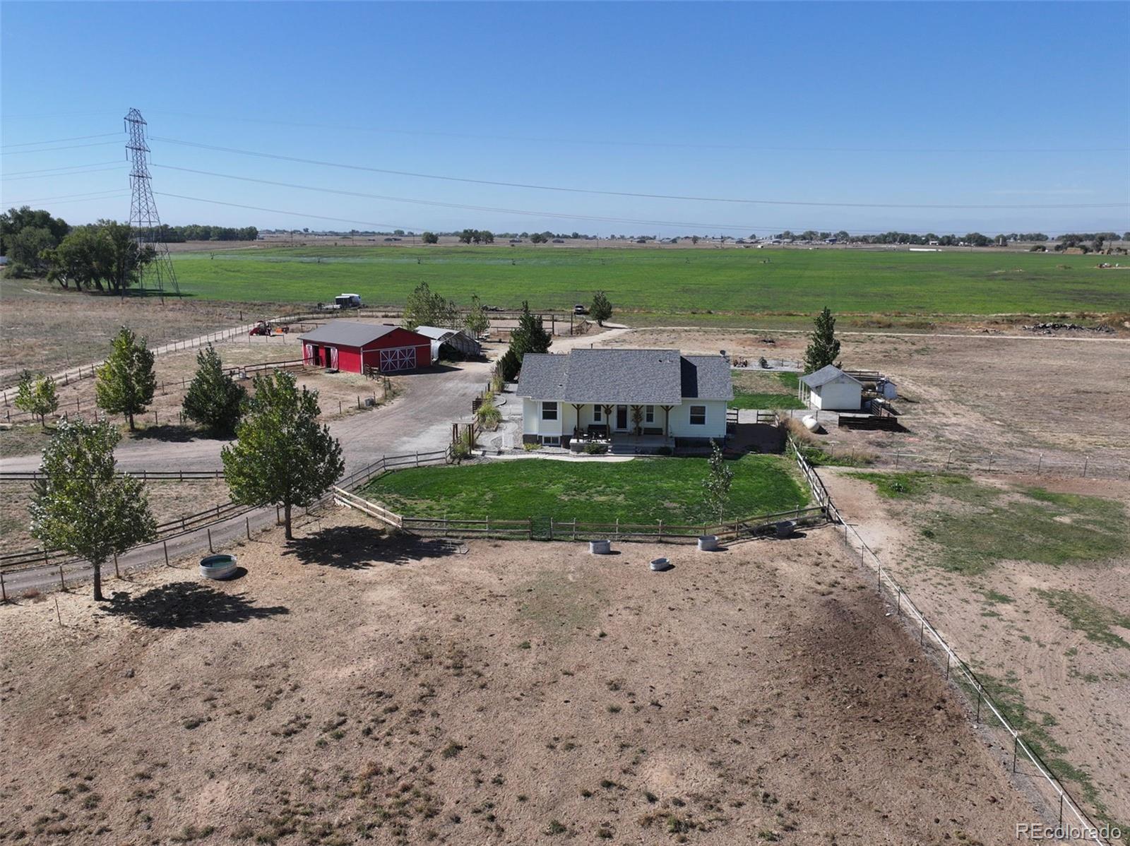 an aerial view of a house with outdoor space