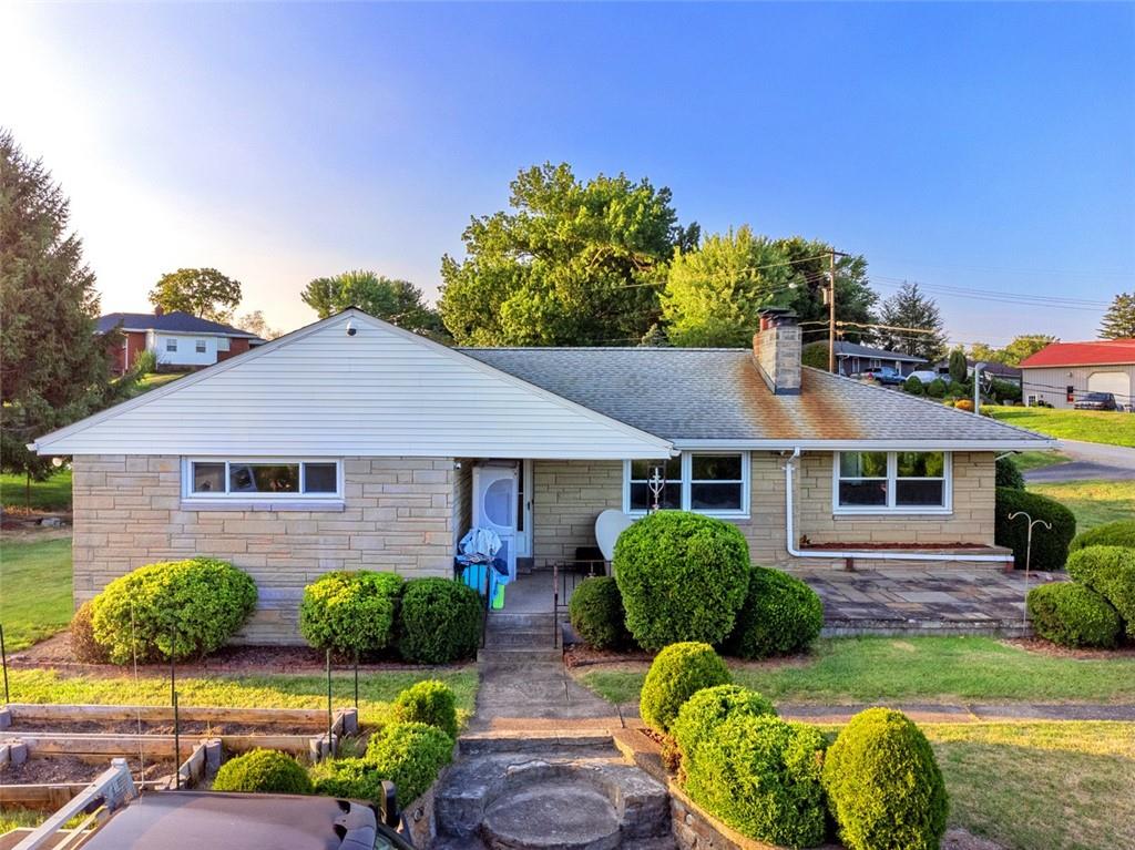 front view of house with a yard