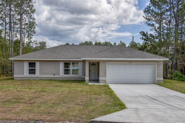 front view of house with a yard