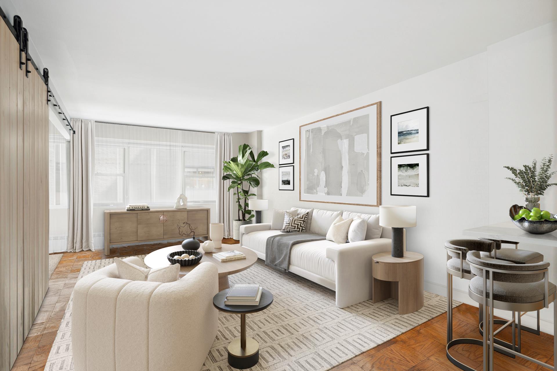 a living room with furniture and wooden floor