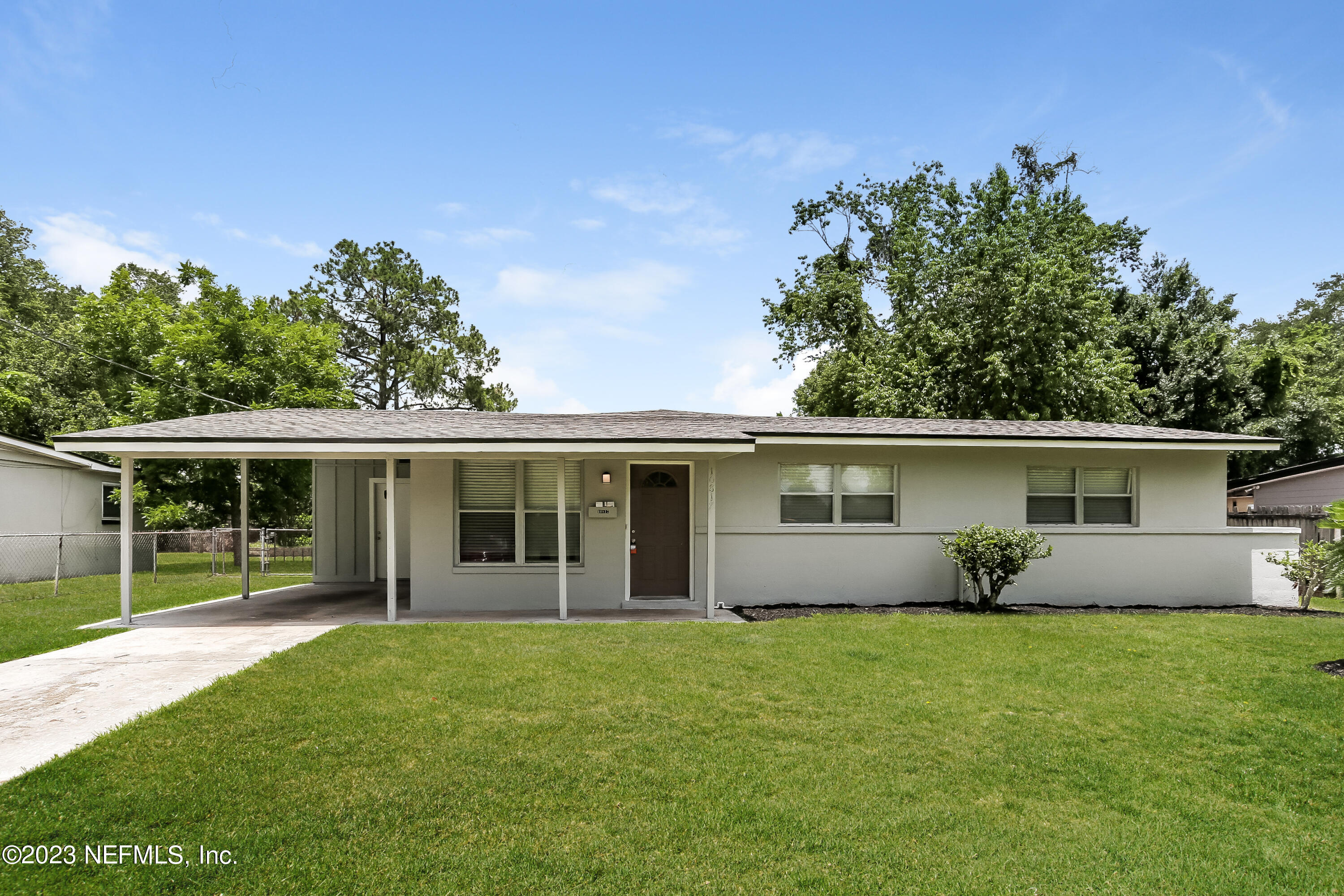 front view of house with a yard