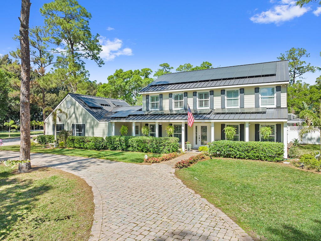 front view of a house with a yard