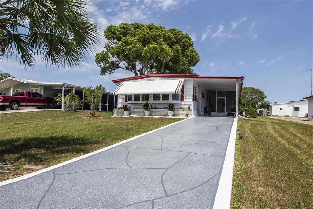 a view of a house with a swimming pool