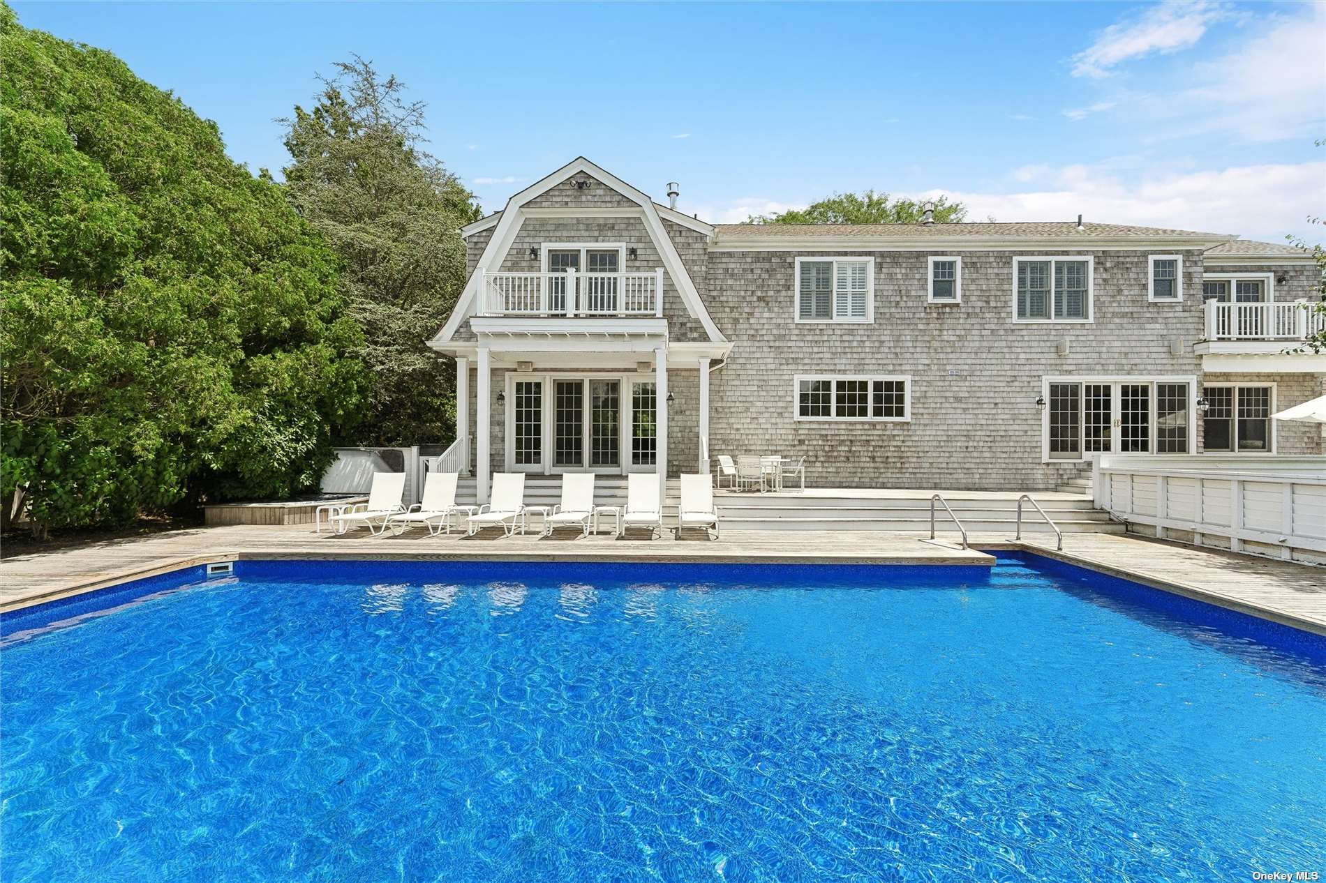 a front view of a house with swimming pool