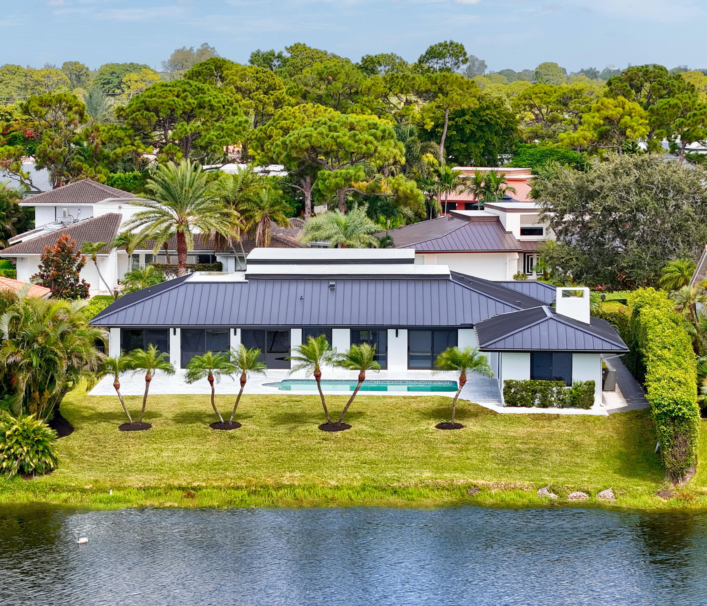 a view of a swimming pool with a patio