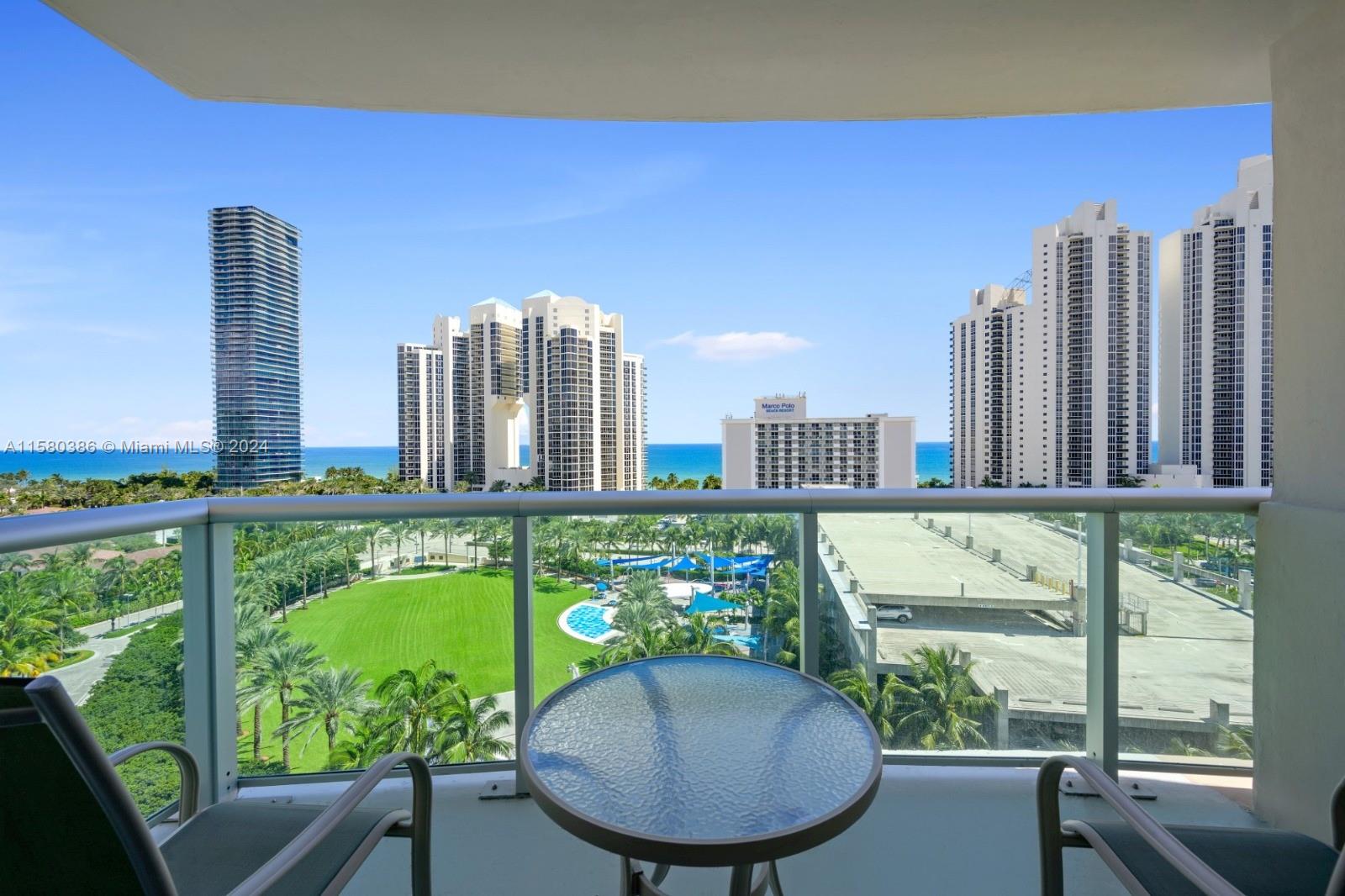 a view of a balcony with chairs