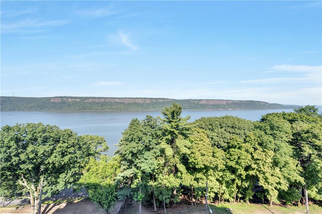 a view of a lake with a yard